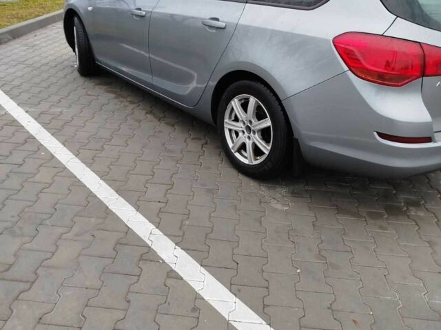 Серый Опель Астра, объемом двигателя 1.2 л и пробегом 254 тыс. км за 5000 $, фото 7 на Automoto.ua