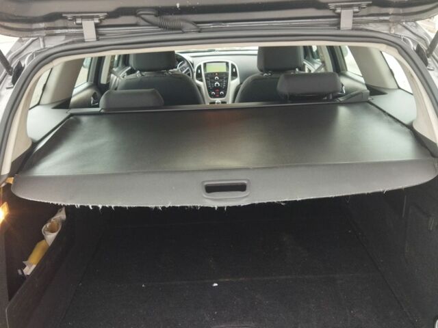 Серый Опель Астра, объемом двигателя 1.7 л и пробегом 238 тыс. км за 6200 $, фото 7 на Automoto.ua