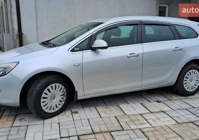 Серый Опель Астра, объемом двигателя 1.7 л и пробегом 266 тыс. км за 7500 $, фото 2 на Automoto.ua