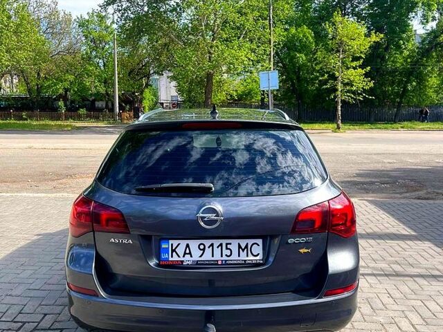 Сірий Опель Астра, об'ємом двигуна 1.2 л та пробігом 236 тис. км за 5500 $, фото 4 на Automoto.ua