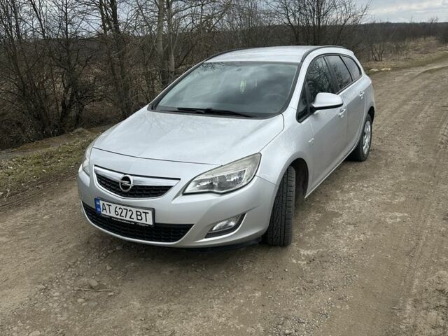 Серый Опель Астра, объемом двигателя 1.2 л и пробегом 242 тыс. км за 5000 $, фото 2 на Automoto.ua