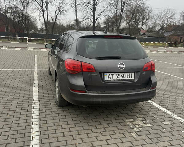 Серый Опель Астра, объемом двигателя 1.69 л и пробегом 315 тыс. км за 6300 $, фото 13 на Automoto.ua