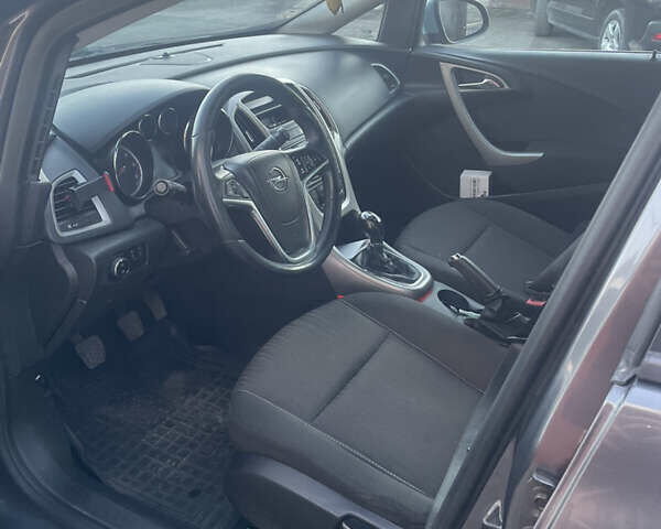 Серый Опель Астра, объемом двигателя 1.25 л и пробегом 229 тыс. км за 6500 $, фото 7 на Automoto.ua