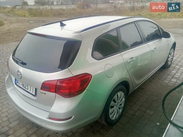 Серый Опель Астра, объемом двигателя 1.7 л и пробегом 206 тыс. км за 7499 $, фото 3 на Automoto.ua