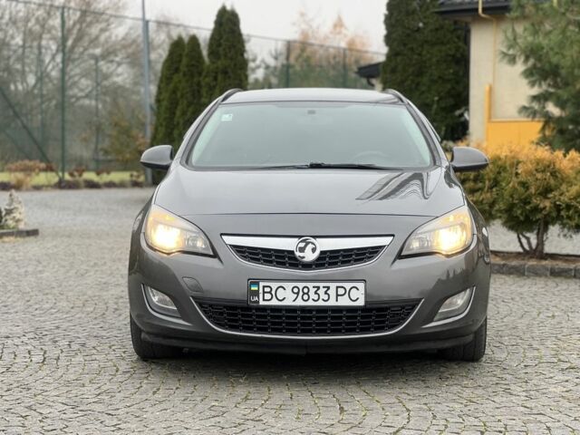 Серый Опель Астра, объемом двигателя 1.2 л и пробегом 264 тыс. км за 4750 $, фото 4 на Automoto.ua