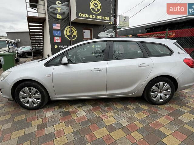 Серый Опель Астра, объемом двигателя 1.25 л и пробегом 238 тыс. км за 5499 $, фото 3 на Automoto.ua