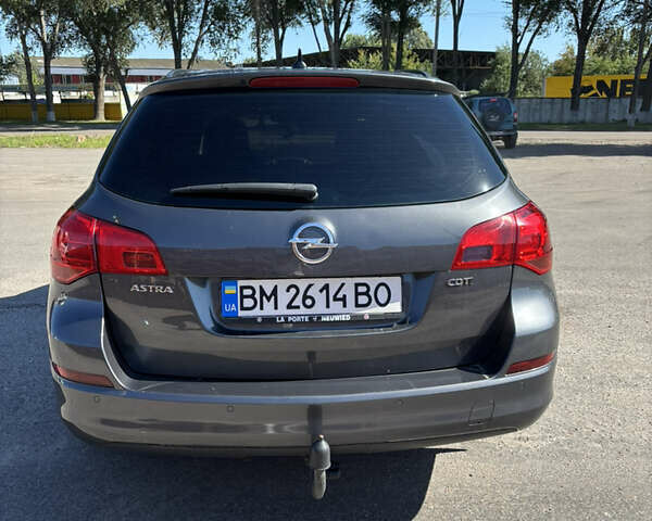 Серый Опель Астра, объемом двигателя 1.69 л и пробегом 208 тыс. км за 7500 $, фото 6 на Automoto.ua