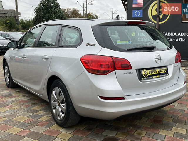Серый Опель Астра, объемом двигателя 1.25 л и пробегом 238 тыс. км за 5499 $, фото 4 на Automoto.ua