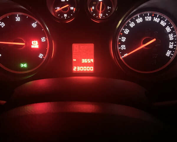 Серый Опель Астра, объемом двигателя 1.69 л и пробегом 230 тыс. км за 7600 $, фото 2 на Automoto.ua