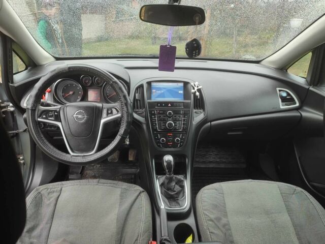 Серый Опель Астра, объемом двигателя 1.2 л и пробегом 254 тыс. км за 5000 $, фото 16 на Automoto.ua