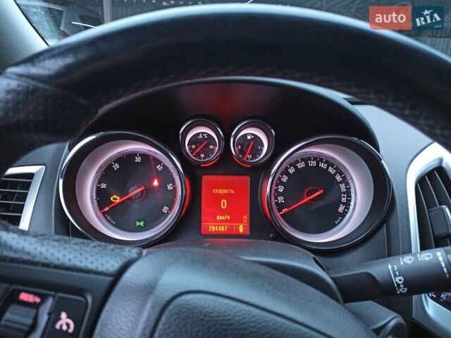 Серый Опель Астра, объемом двигателя 2 л и пробегом 285 тыс. км за 7000 $, фото 11 на Automoto.ua