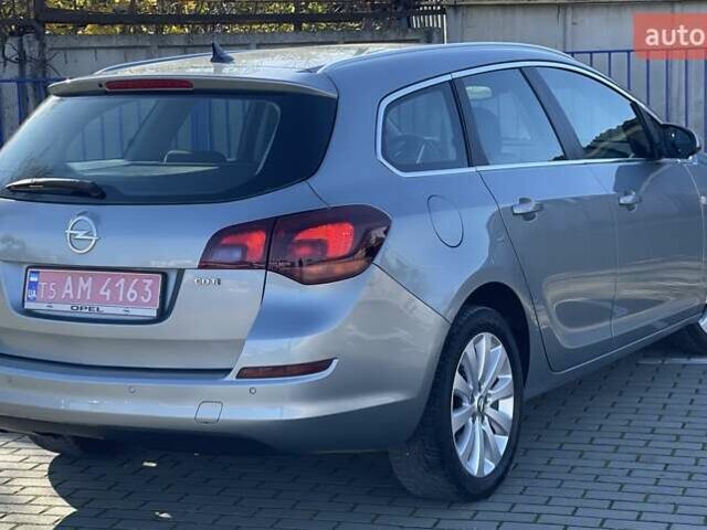 Серый Опель Астра, объемом двигателя 1.7 л и пробегом 259 тыс. км за 7700 $, фото 19 на Automoto.ua