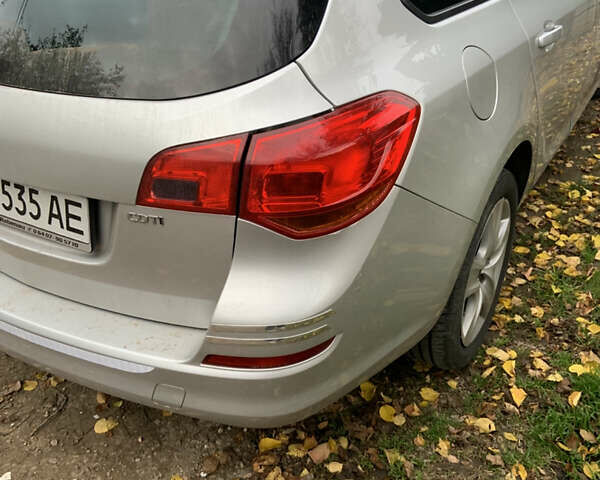 Серый Опель Астра, объемом двигателя 1.69 л и пробегом 230 тыс. км за 7600 $, фото 9 на Automoto.ua