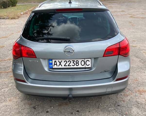 Сірий Опель Астра, об'ємом двигуна 1.6 л та пробігом 223 тис. км за 7600 $, фото 1 на Automoto.ua