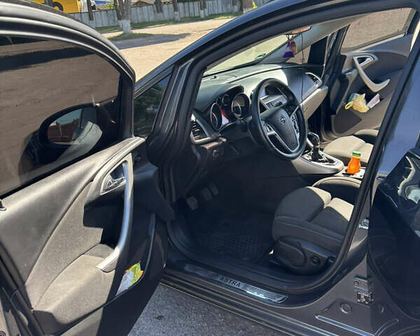 Серый Опель Астра, объемом двигателя 1.69 л и пробегом 208 тыс. км за 7500 $, фото 16 на Automoto.ua