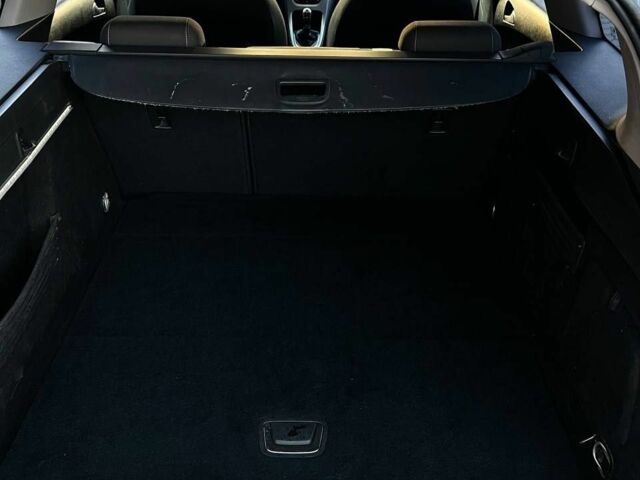 Серый Опель Астра, объемом двигателя 1.3 л и пробегом 291 тыс. км за 5600 $, фото 6 на Automoto.ua