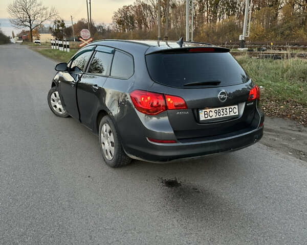 Сірий Опель Астра, об'ємом двигуна 1.25 л та пробігом 261 тис. км за 4100 $, фото 4 на Automoto.ua
