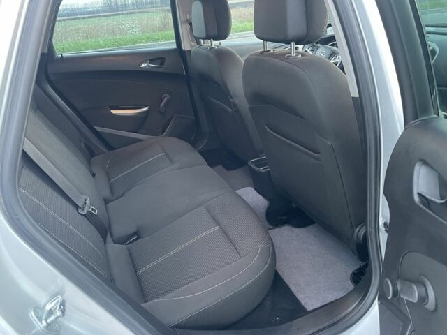 Серый Опель Астра, объемом двигателя 1.2 л и пробегом 255 тыс. км за 5700 $, фото 8 на Automoto.ua