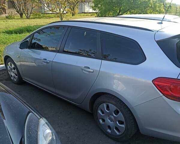 Сірий Опель Астра, об'ємом двигуна 1.3 л та пробігом 218 тис. км за 7950 $, фото 2 на Automoto.ua