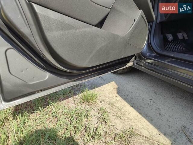 Серый Опель Астра, объемом двигателя 1.7 л и пробегом 292 тыс. км за 6990 $, фото 5 на Automoto.ua