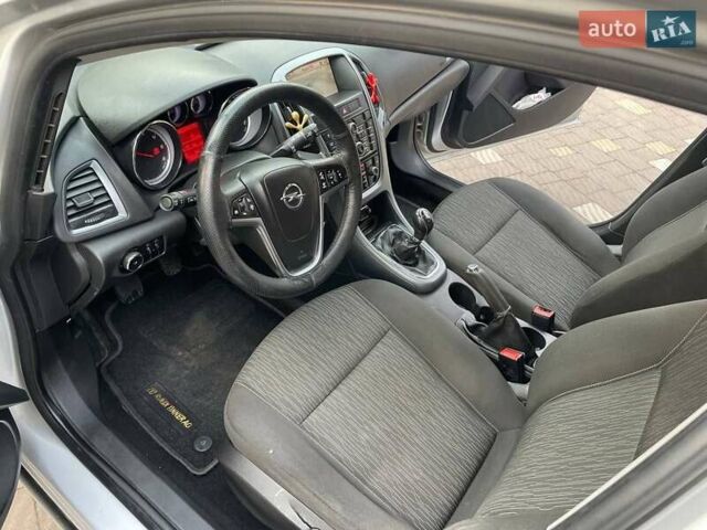 Серый Опель Астра, объемом двигателя 1.2 л и пробегом 306 тыс. км за 5900 $, фото 8 на Automoto.ua