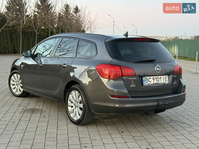 Серый Опель Астра, объемом двигателя 1.7 л и пробегом 215 тыс. км за 7350 $, фото 4 на Automoto.ua