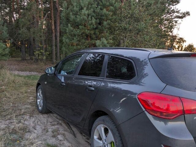 Серый Опель Астра, объемом двигателя 1.2 л и пробегом 261 тыс. км за 6500 $, фото 2 на Automoto.ua