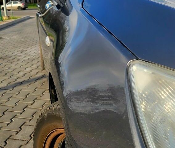 Серый Опель Астра, объемом двигателя 1.4 л и пробегом 249 тыс. км за 7300 $, фото 1 на Automoto.ua