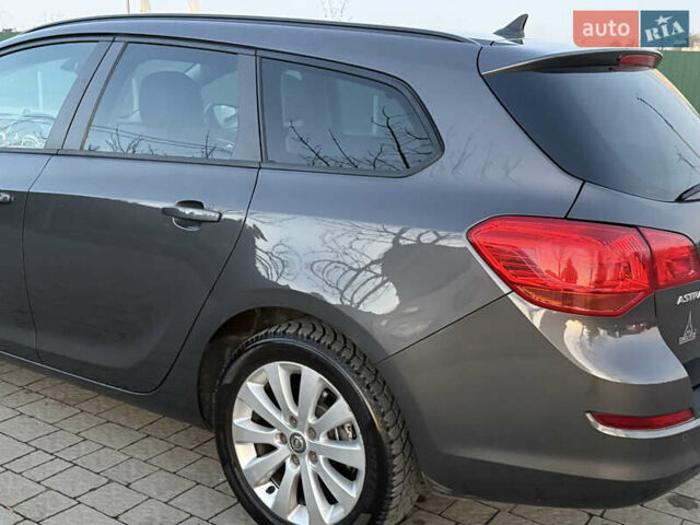 Серый Опель Астра, объемом двигателя 1.7 л и пробегом 215 тыс. км за 7350 $, фото 24 на Automoto.ua