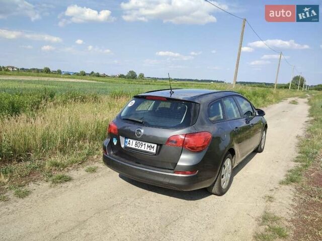 Серый Опель Астра, объемом двигателя 1.7 л и пробегом 292 тыс. км за 6990 $, фото 2 на Automoto.ua