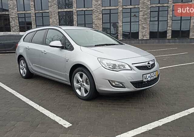 Сірий Опель Астра, об'ємом двигуна 1.4 л та пробігом 128 тис. км за 8650 $, фото 1 на Automoto.ua