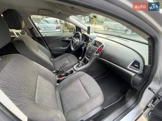 Серый Опель Астра, объемом двигателя 1.2 л и пробегом 306 тыс. км за 5900 $, фото 14 на Automoto.ua