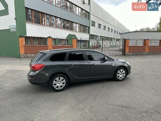 Серый Опель Астра, объемом двигателя 1.3 л и пробегом 220 тыс. км за 7100 $, фото 8 на Automoto.ua