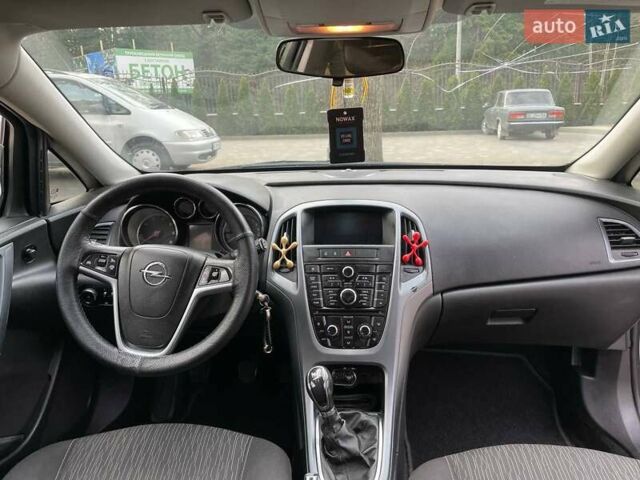 Серый Опель Астра, объемом двигателя 1.2 л и пробегом 306 тыс. км за 5900 $, фото 9 на Automoto.ua