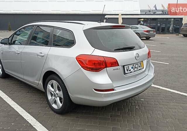 Сірий Опель Астра, об'ємом двигуна 1.4 л та пробігом 128 тис. км за 8650 $, фото 7 на Automoto.ua
