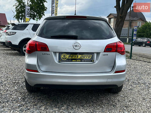 Серый Опель Астра, объемом двигателя 1.69 л и пробегом 243 тыс. км за 7500 $, фото 4 на Automoto.ua