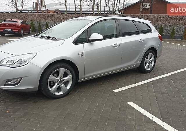 Сірий Опель Астра, об'ємом двигуна 1.4 л та пробігом 128 тис. км за 8650 $, фото 4 на Automoto.ua