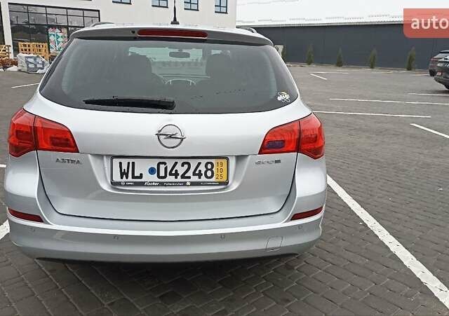 Сірий Опель Астра, об'ємом двигуна 1.4 л та пробігом 128 тис. км за 8650 $, фото 8 на Automoto.ua
