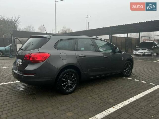 Серый Опель Астра, объемом двигателя 1.69 л и пробегом 241 тыс. км за 5900 $, фото 5 на Automoto.ua