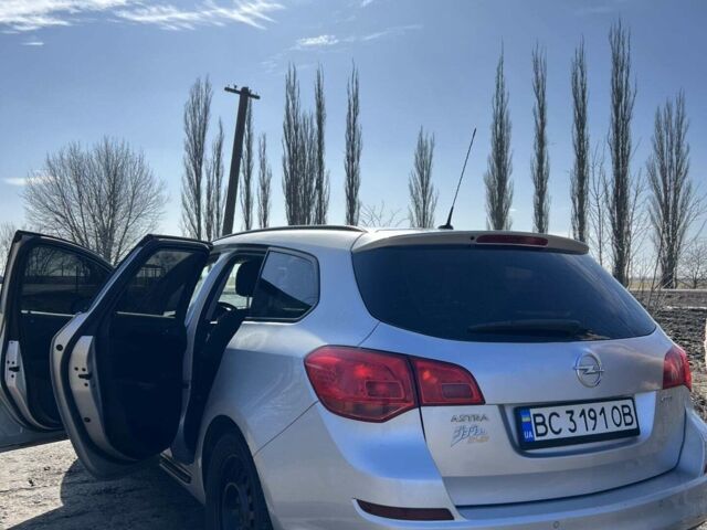Сірий Опель Астра, об'ємом двигуна 1.69 л та пробігом 244 тис. км за 6600 $, фото 4 на Automoto.ua