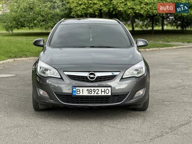 Серый Опель Астра, объемом двигателя 1.3 л и пробегом 220 тыс. км за 7100 $, фото 56 на Automoto.ua