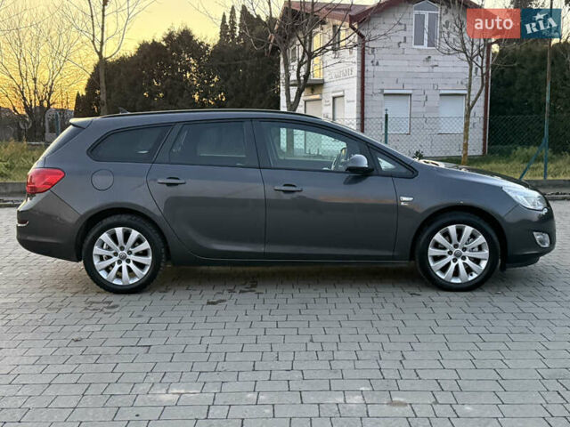 Серый Опель Астра, объемом двигателя 1.7 л и пробегом 215 тыс. км за 7350 $, фото 18 на Automoto.ua