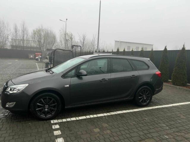 Серый Опель Астра, объемом двигателя 1.7 л и пробегом 241 тыс. км за 5900 $, фото 2 на Automoto.ua