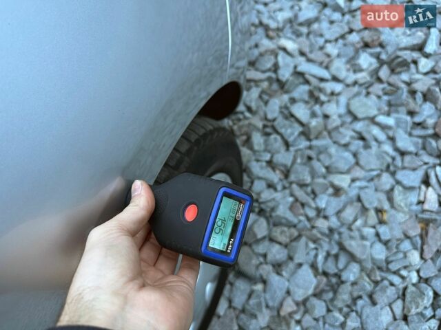 Серый Опель Астра, объемом двигателя 1.7 л и пробегом 228 тыс. км за 7000 $, фото 129 на Automoto.ua