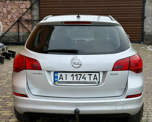 Серый Опель Астра, объемом двигателя 1.7 л и пробегом 252 тыс. км за 5900 $, фото 7 на Automoto.ua