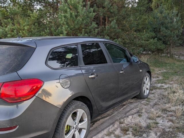 Серый Опель Астра, объемом двигателя 1.2 л и пробегом 261 тыс. км за 6500 $, фото 3 на Automoto.ua