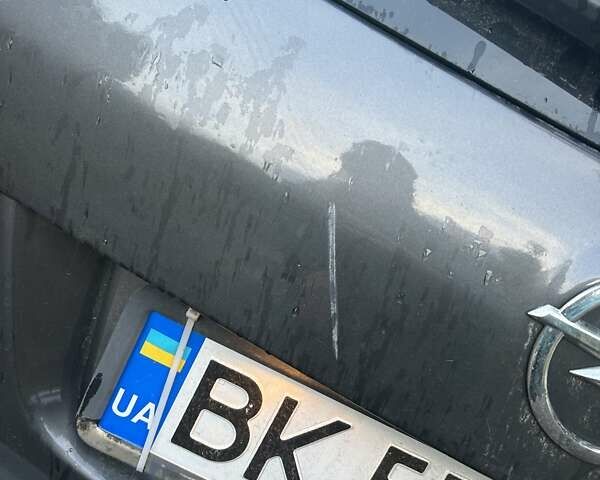 Серый Опель Астра, объемом двигателя 1.6 л и пробегом 275 тыс. км за 7500 $, фото 4 на Automoto.ua