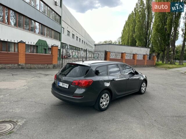 Серый Опель Астра, объемом двигателя 1.3 л и пробегом 220 тыс. км за 7100 $, фото 58 на Automoto.ua
