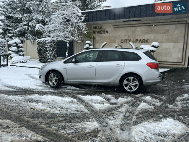 Серый Опель Астра, объемом двигателя 1.7 л и пробегом 282 тыс. км за 6100 $, фото 2 на Automoto.ua