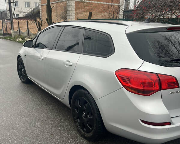 Серый Опель Астра, объемом двигателя 1.7 л и пробегом 255 тыс. км за 6200 $, фото 8 на Automoto.ua